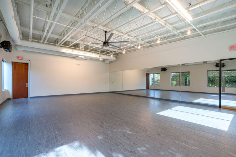 Empty dance studio with mirrors.